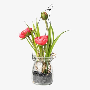 Fleur artificielle renoncule dans vase en verre avec pendentif en métal