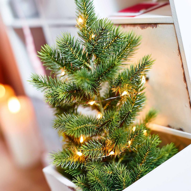 KunstTannenbaum im Jutesack grün DEPOT