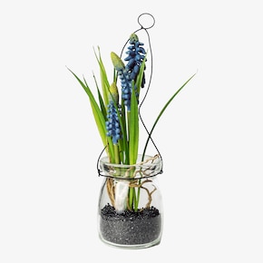 Kunstbloem hyacint in glazen pot